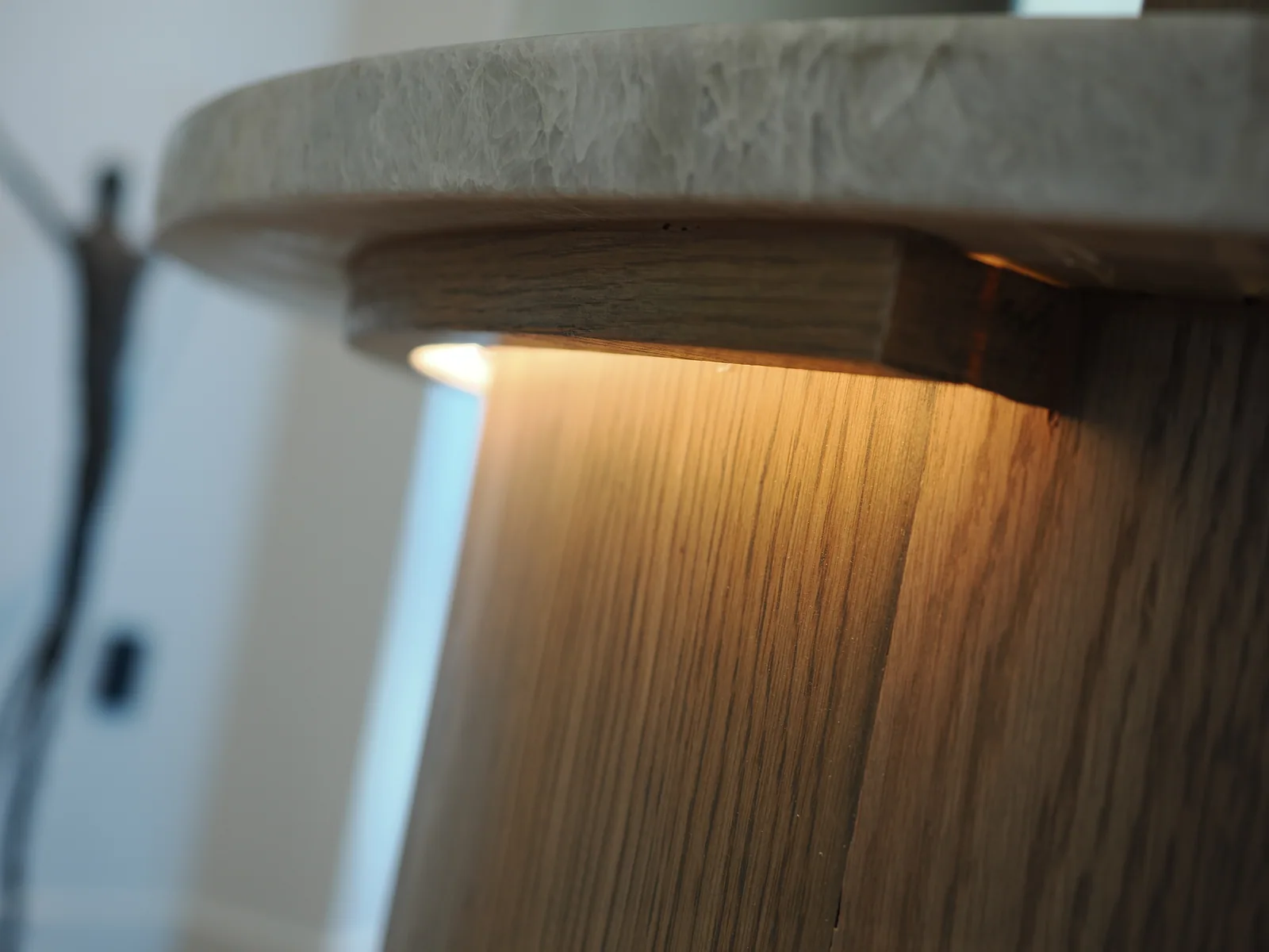 Rounded counter edge and illuminated wood island front