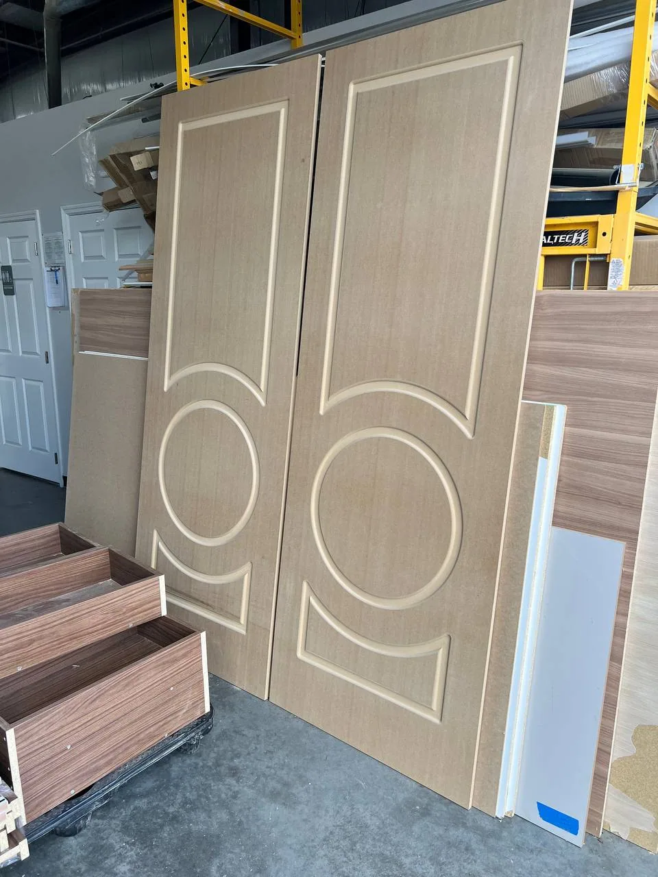 Client-supplied workshop view of a decorative wood panel during fabrication