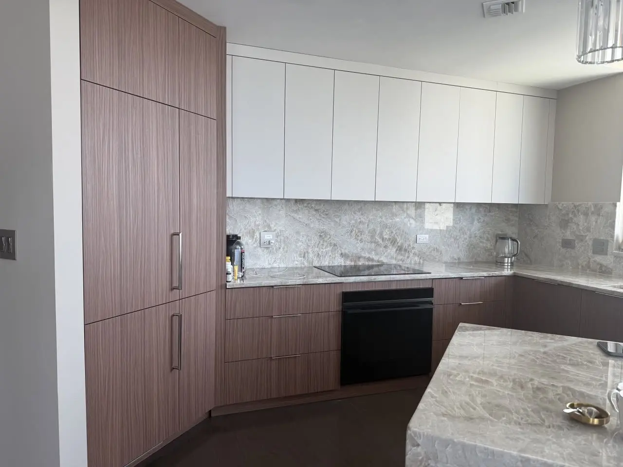 Completed walnut and white kitchen by LeVika